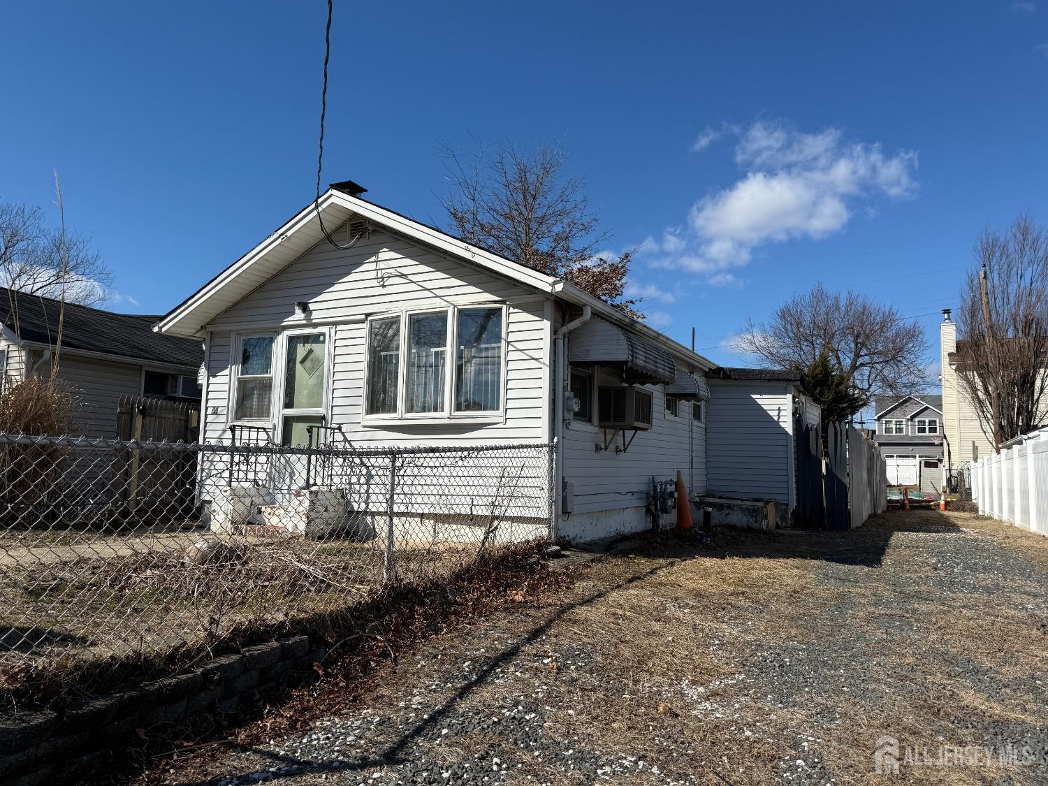 50 Pacific Boulevard Old Bridge, NJ 07735 - Photo 3 of 12 a front view of a house with a yard