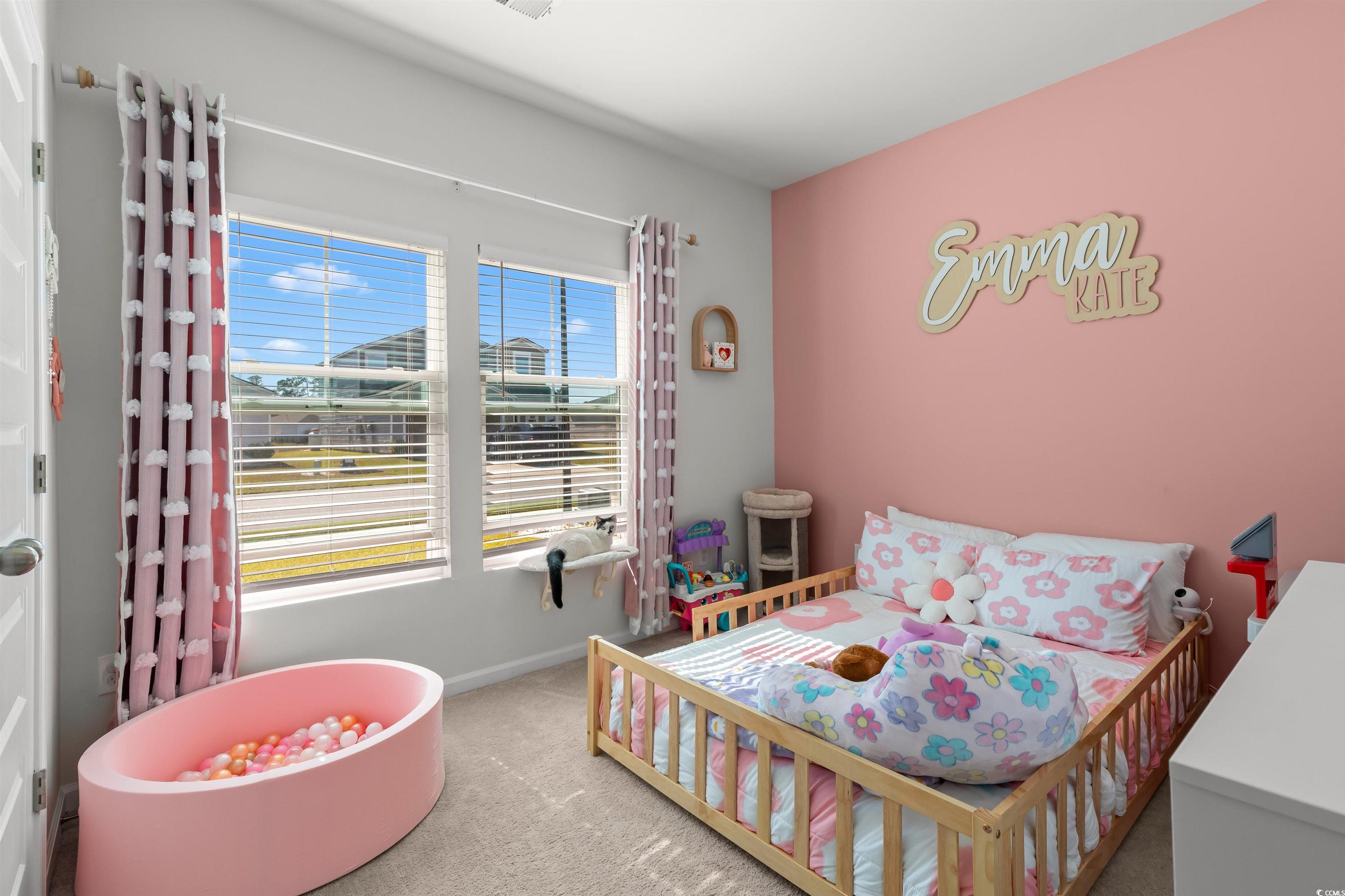 1067 Saltgrass Way Myrtle Beach, SC 29588 - Photo 5 of 40 Carpeted bedroom with baseboards