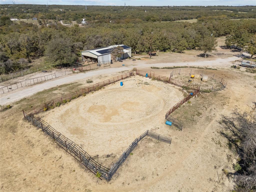 262 North Cheyenne Springtown, TX 76082 - Photo 26 of 35 Overview of rural landscape featuring a heavily wooded area