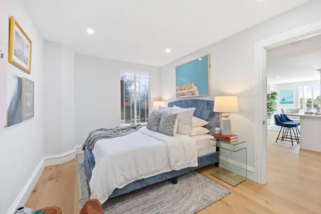a bathroom with a sink double vanity and a mirror