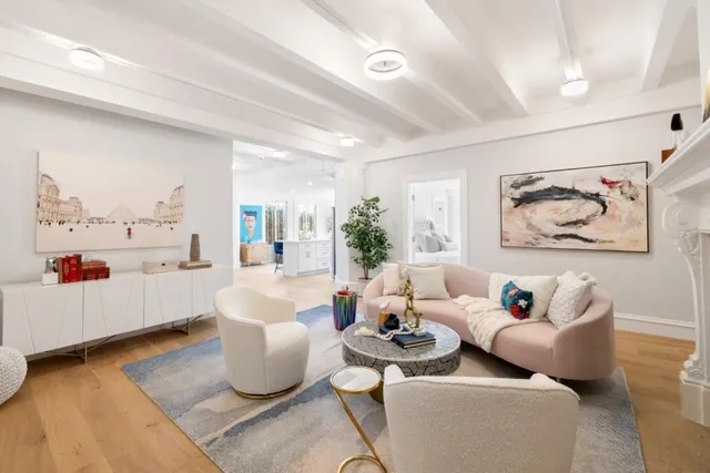 a view of kitchen with microwave stove top oven and cabinets