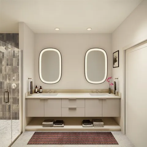 a bathroom with a double vanity sink and a mirror
