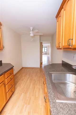 a bedroom with a bed and cabinets