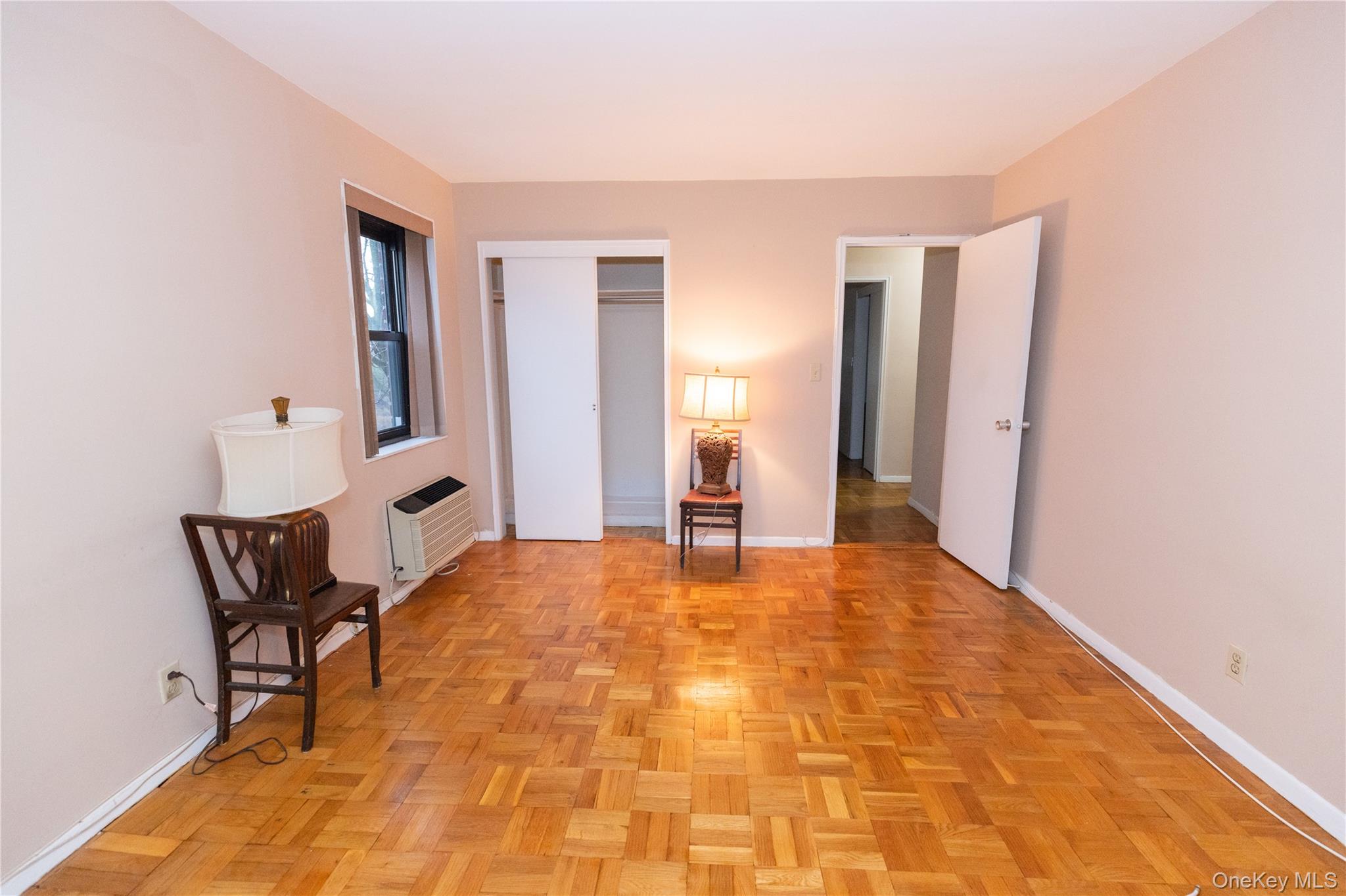 266 Pelham Road, Unit 4H New Rochelle, NY 10805 - Photo 10 of 13 a view of a livingroom with furniture and an entryway
