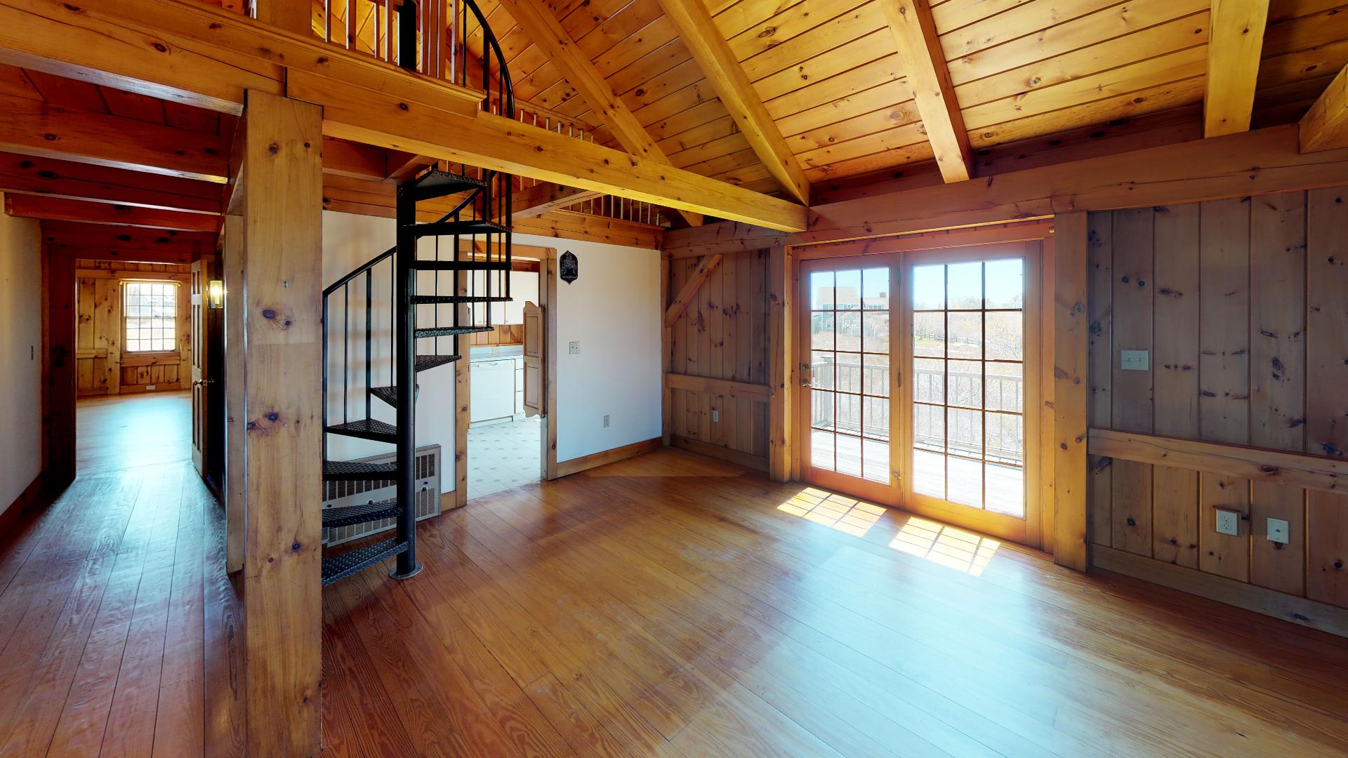 234 Madaket Road Nantucket, MA 02554 - Photo 21 of 50 hall to second-floor master, spiral stairs to loft and French door to sun deck