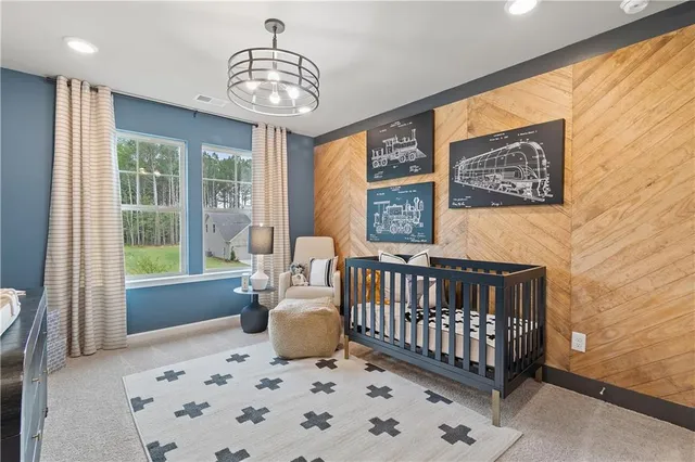 a bedroom with furniture and windows