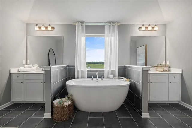 a room with a sink and a mirror