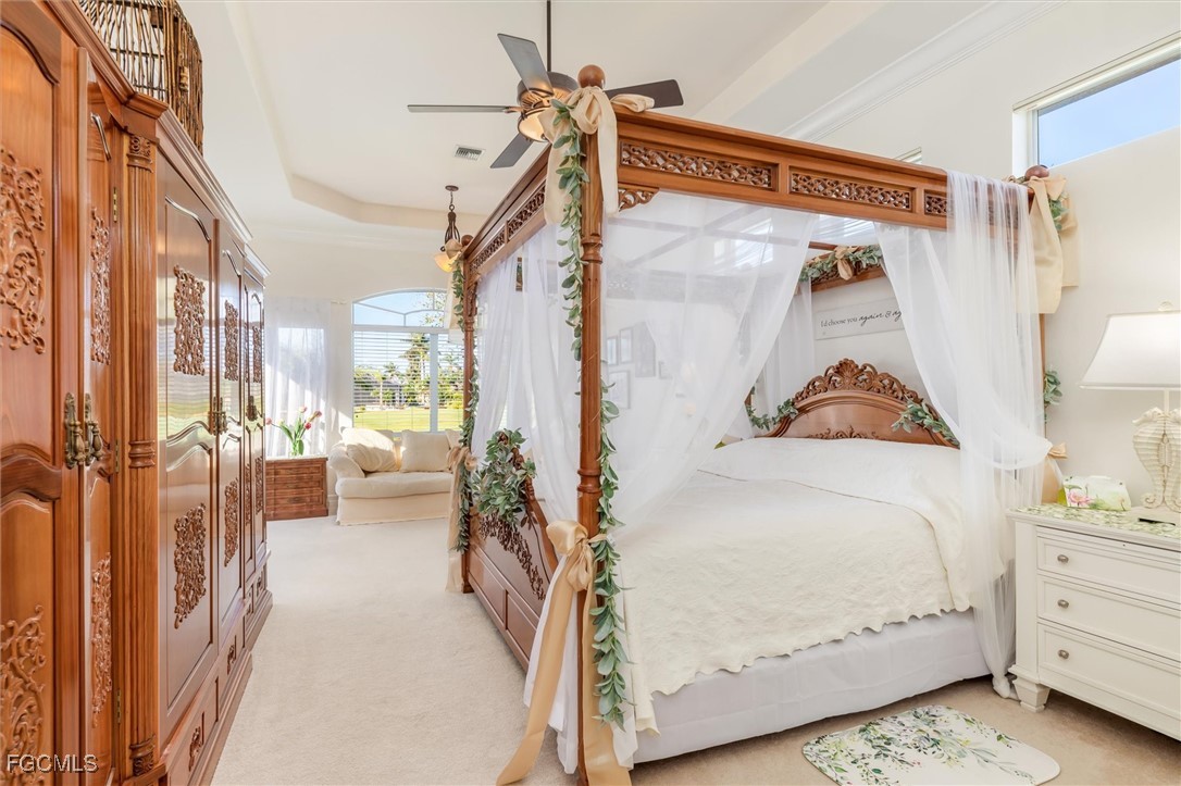 11768 Lady Anne Circle Cape Coral, FL 33991 - Photo 21 of 49 a view of a bedroom the closet and utility room