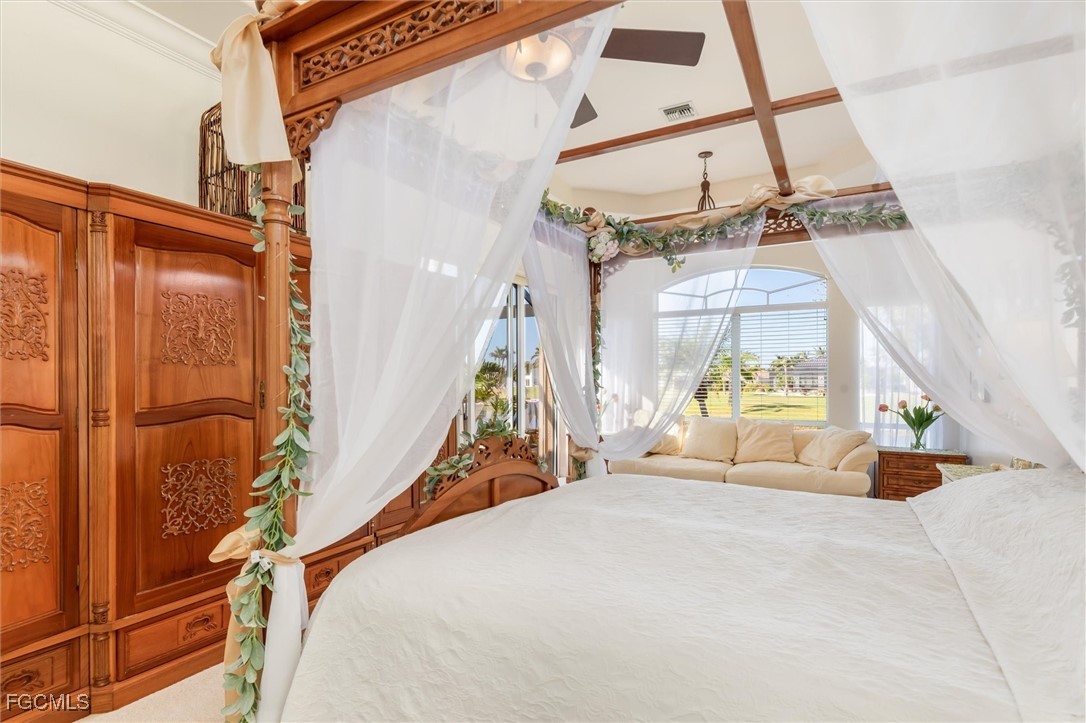 11768 Lady Anne Circle Cape Coral, FL 33991 - Photo 22 of 49 a bed room with a bed and a window