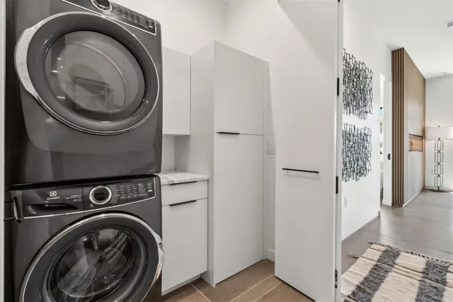 a view of a livingroom with shelves