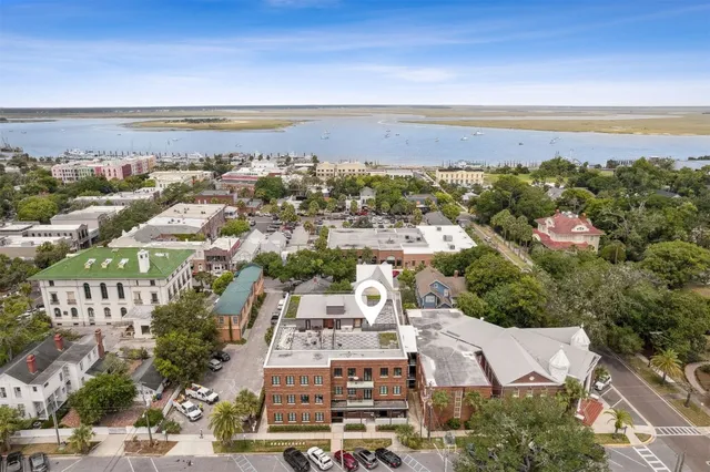 a bathroom with a mirror and a shower