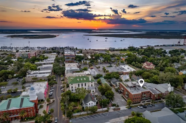 a picture of a bathroom with a shower