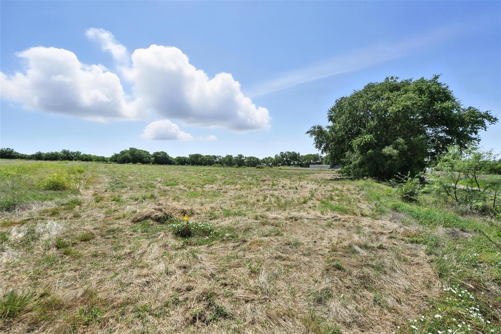 1 Eakin Cemetery Road Justin, TX 76247 - Photo 3 of 16 a view of a lake with houses in the back