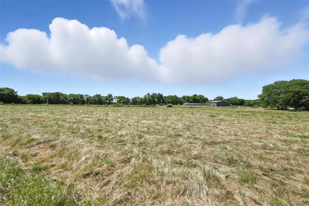 1 Eakin Cemetery Road Justin, TX 76247 - Photo 5 of 16 a view of a lake and sunset