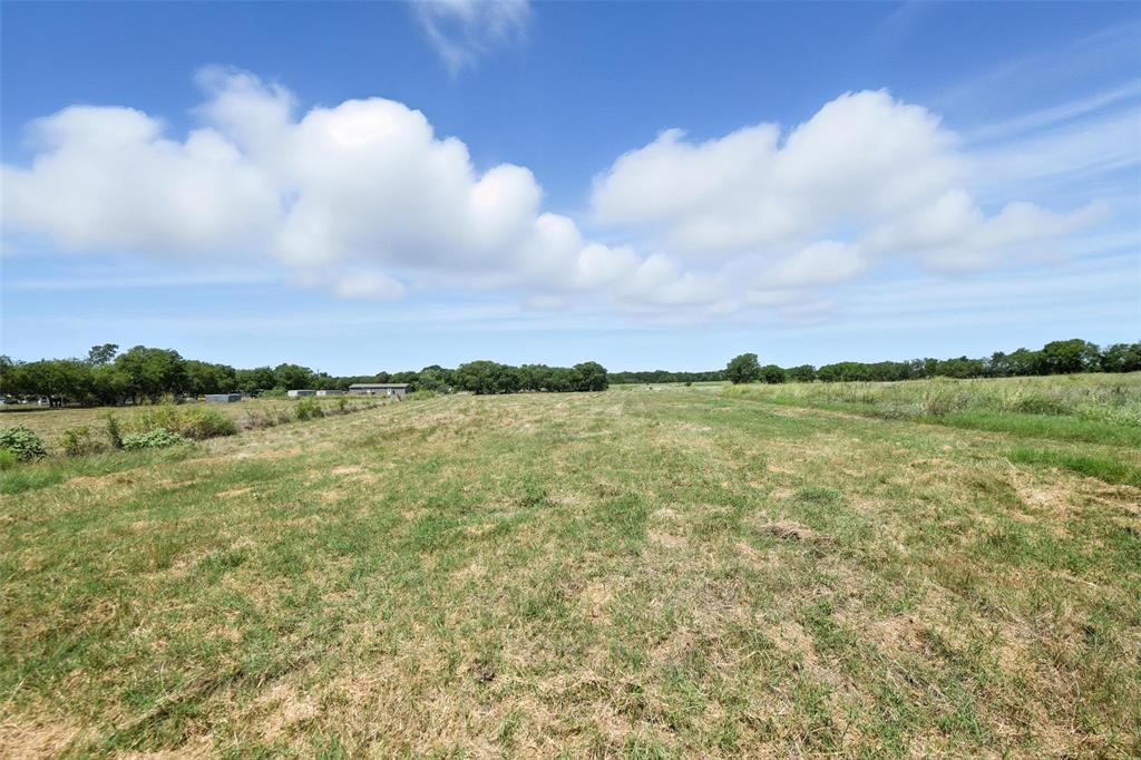 1 Eakin Cemetery Road Justin, TX 76247 - Photo 6 of 16 a view of a lake from a yard
