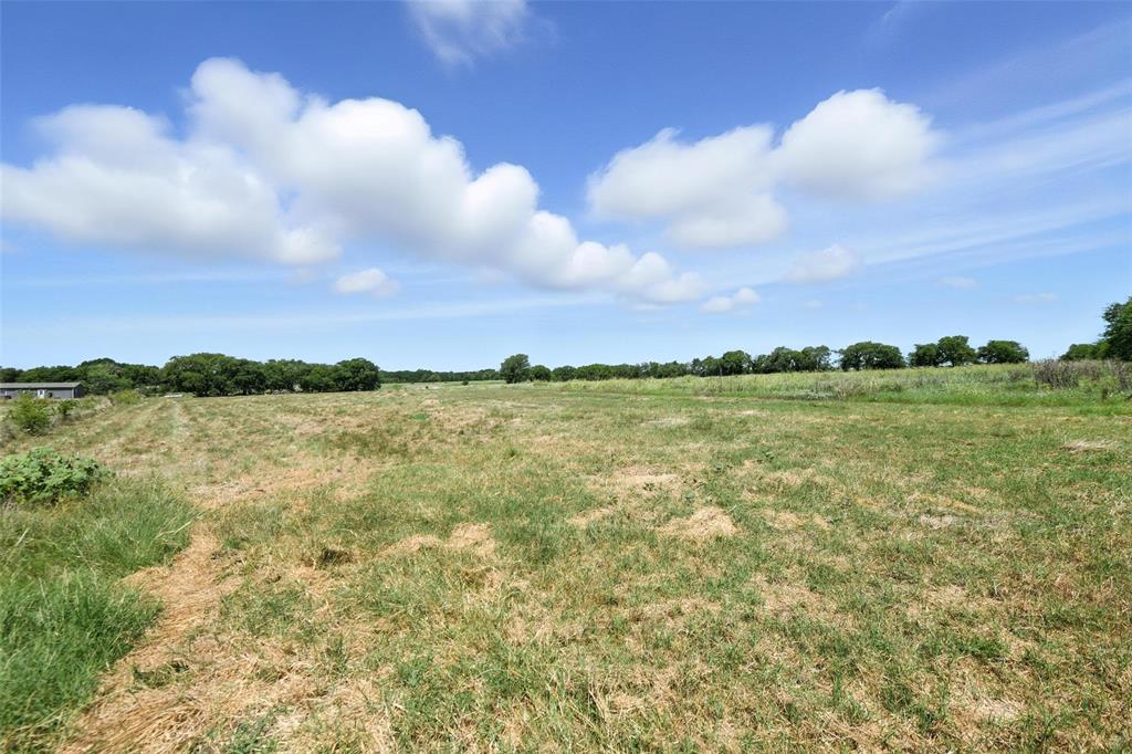 1 Eakin Cemetery Road Justin, TX 76247 - Photo 7 of 16 a view of a lake from a yard