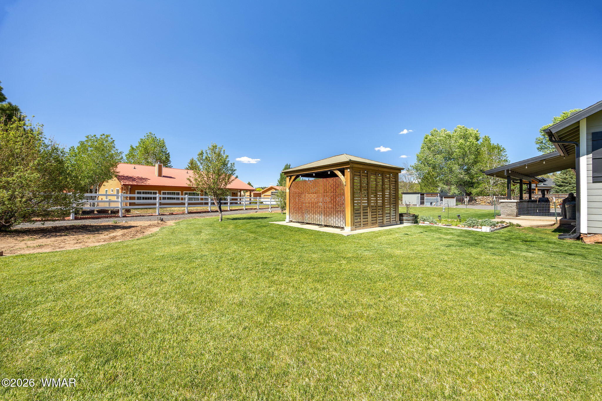 1940 Stonegate Way Heber, AZ 85928 - Photo 51 of 62 a front view of a house with a garden