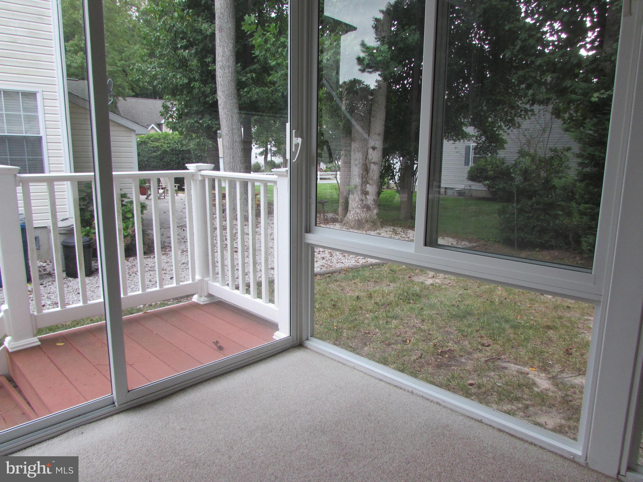 87 Hingham Lane Berlin, MD 21811 - Photo 15 of 39 Side exit from 3 season room
