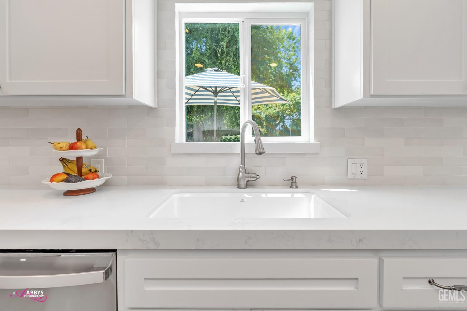 Undisclosed Address Bakersfield, CA 93309 - Photo 11 of 30 a bathroom with a sink and a window