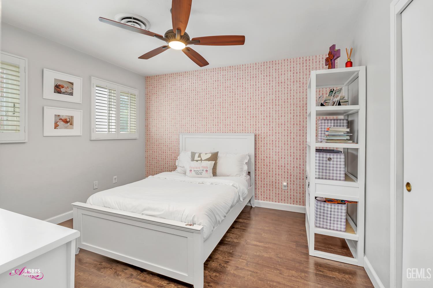 Undisclosed Address Bakersfield, CA 93309 - Photo 19 of 30 a bedroom with a bed and a cabinets