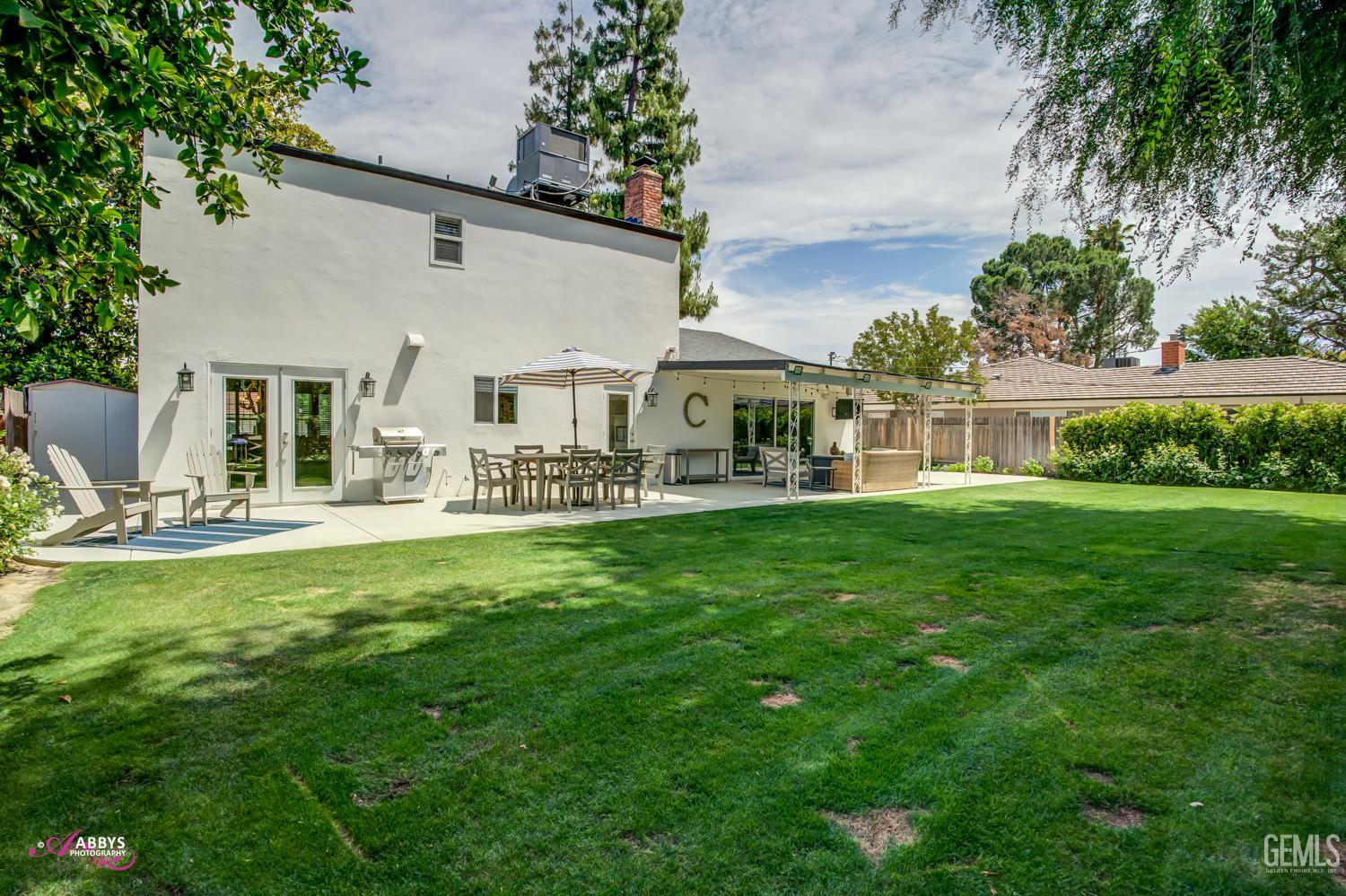 Undisclosed Address Bakersfield, CA 93309 - Photo 24 of 30 a view of a house with a yard porch and sitting area