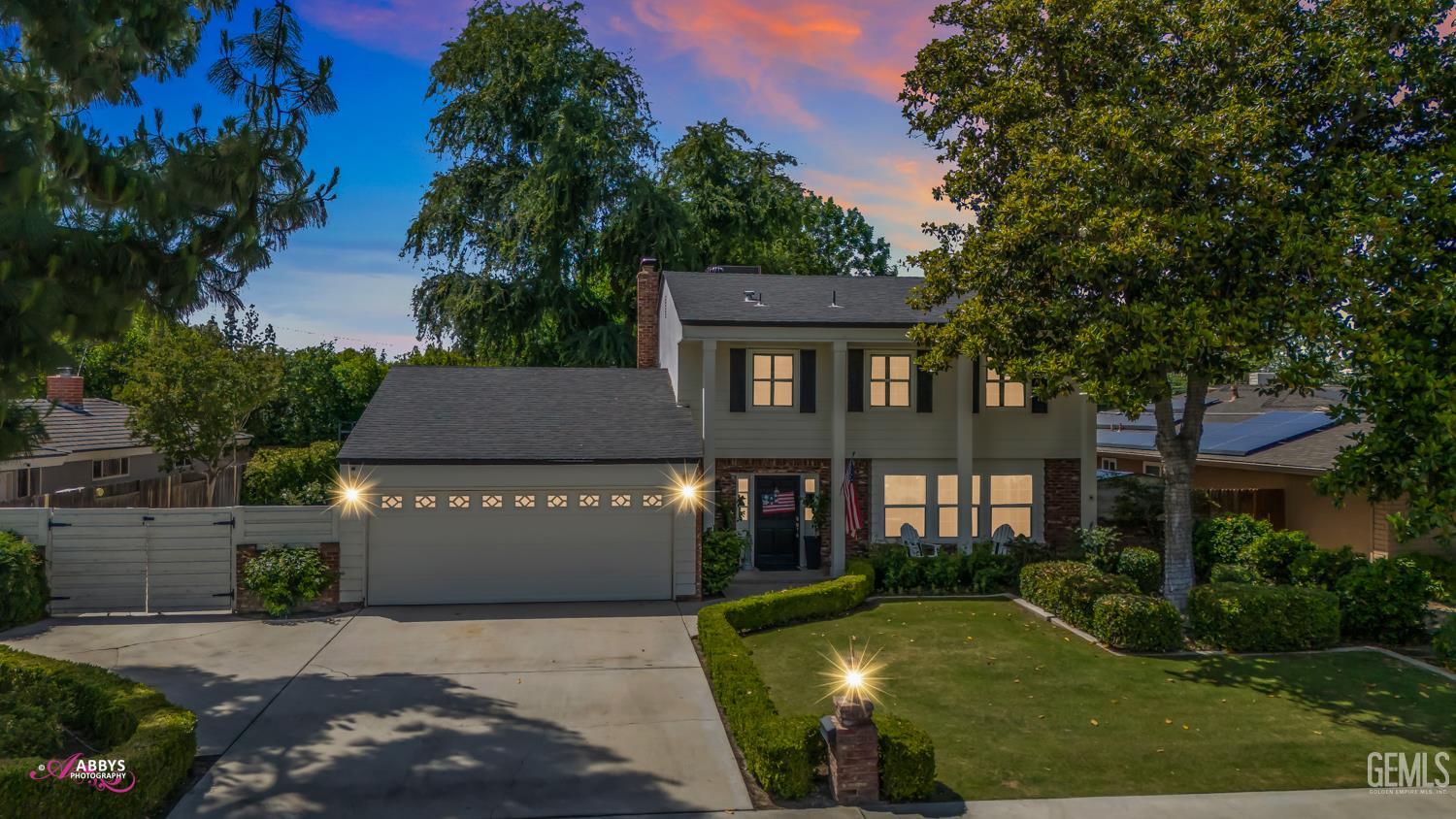 Undisclosed Address Bakersfield, CA 93309 - Photo 30 of 30 a front view of a house with garden