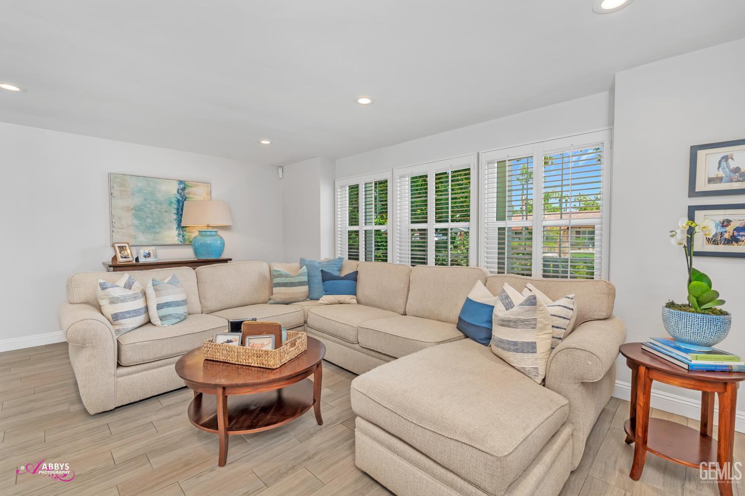 Undisclosed Address Bakersfield, CA 93309 - Photo 5 of 30 a living room with furniture and a large window