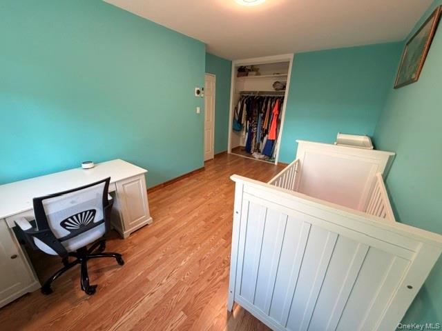150-06 78th Road Queens, NY 11367 - Photo 18 of 22 a living room with furniture and a wooden floor