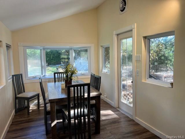 16 Lilac Road Westhampton Beach, NY 11978 - Photo 15 of 25 a view of a dining room with furniture window and wooden floor