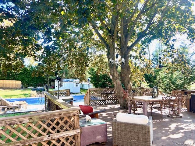 16 Lilac Road Westhampton Beach, NY 11978 - Photo 5 of 25 a outdoor space with furniture