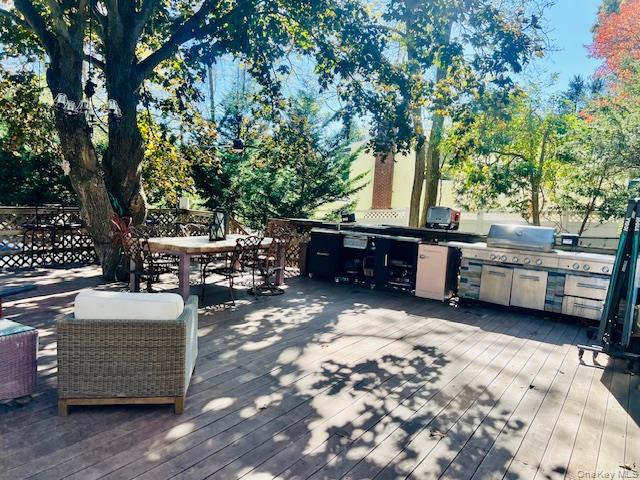 16 Lilac Road Westhampton Beach, NY 11978 - Photo 6 of 25 a view of a backyard with sitting area