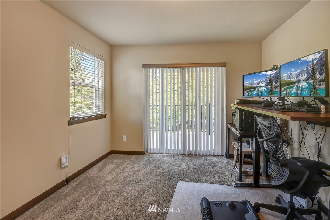 22810 23rd Avenue Southeast, Unit 2 Bothell, WA 98021 - Photo 14 of 16 a view of livingroom with furniture and windows