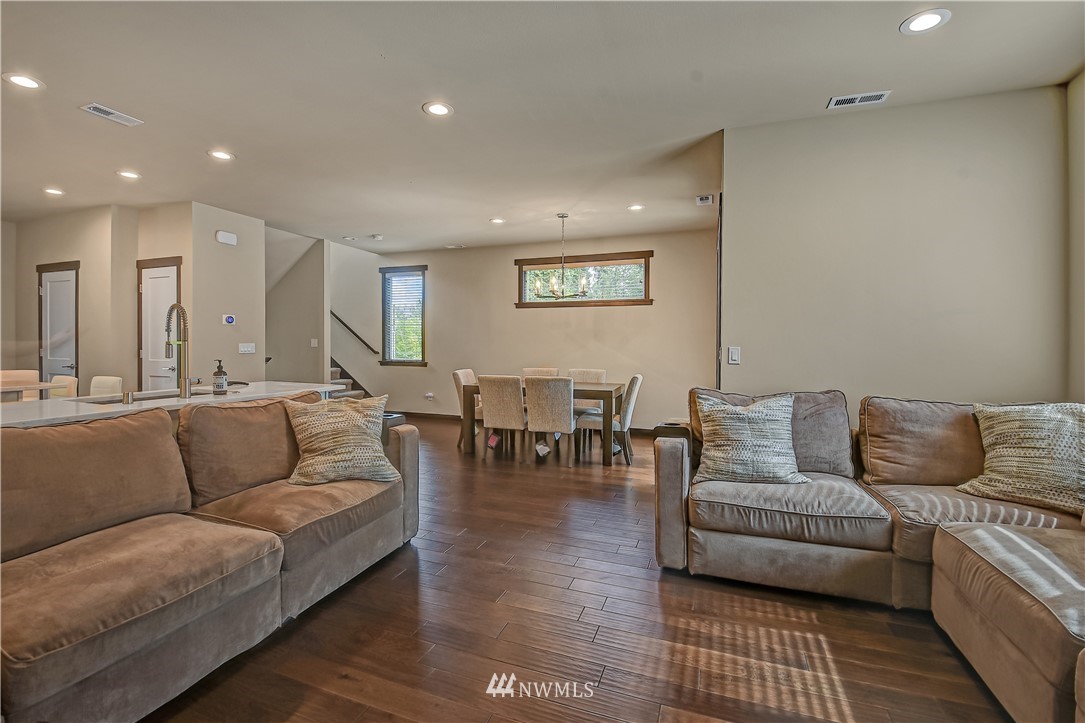 22810 23rd Avenue Southeast, Unit 2 Bothell, WA 98021 - Photo 4 of 16 a living room with furniture and a couch