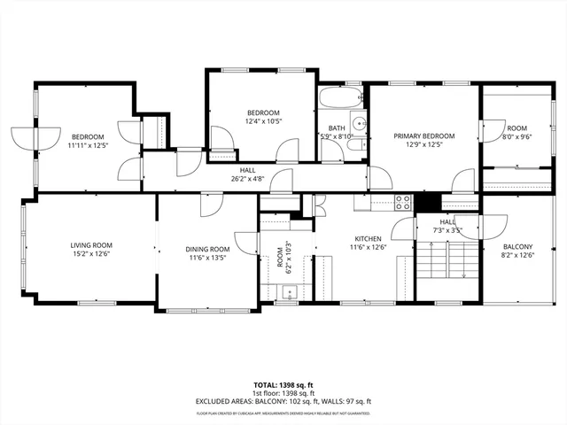 a black and white photo of a living room