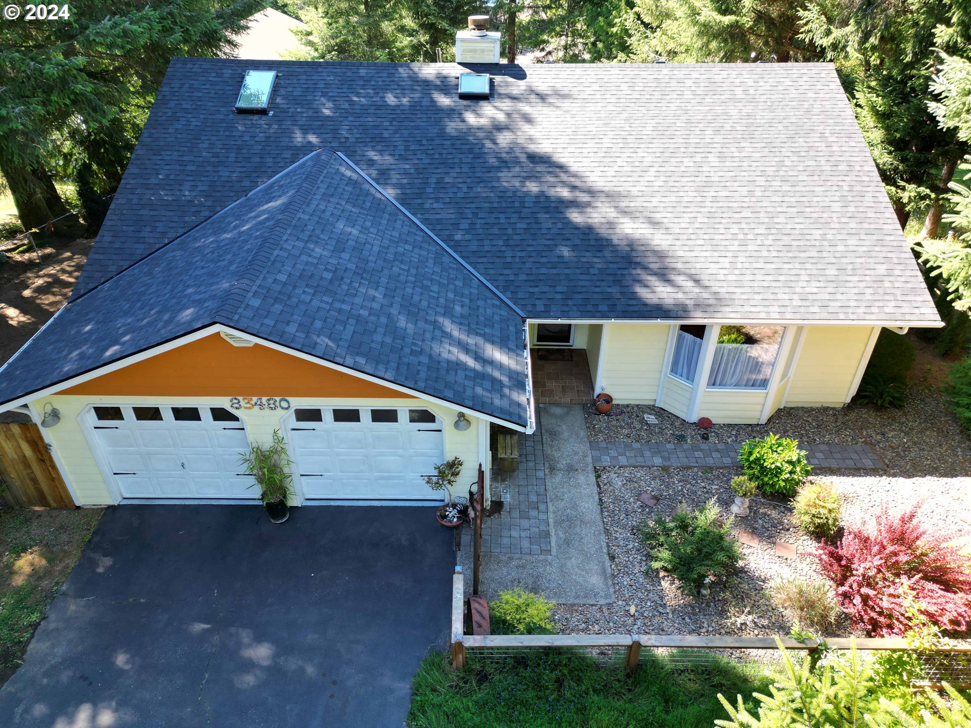 83480 Clear Lake Road Florence, OR 97439 - Photo 2 of 48 an aerial view of a house with a yard