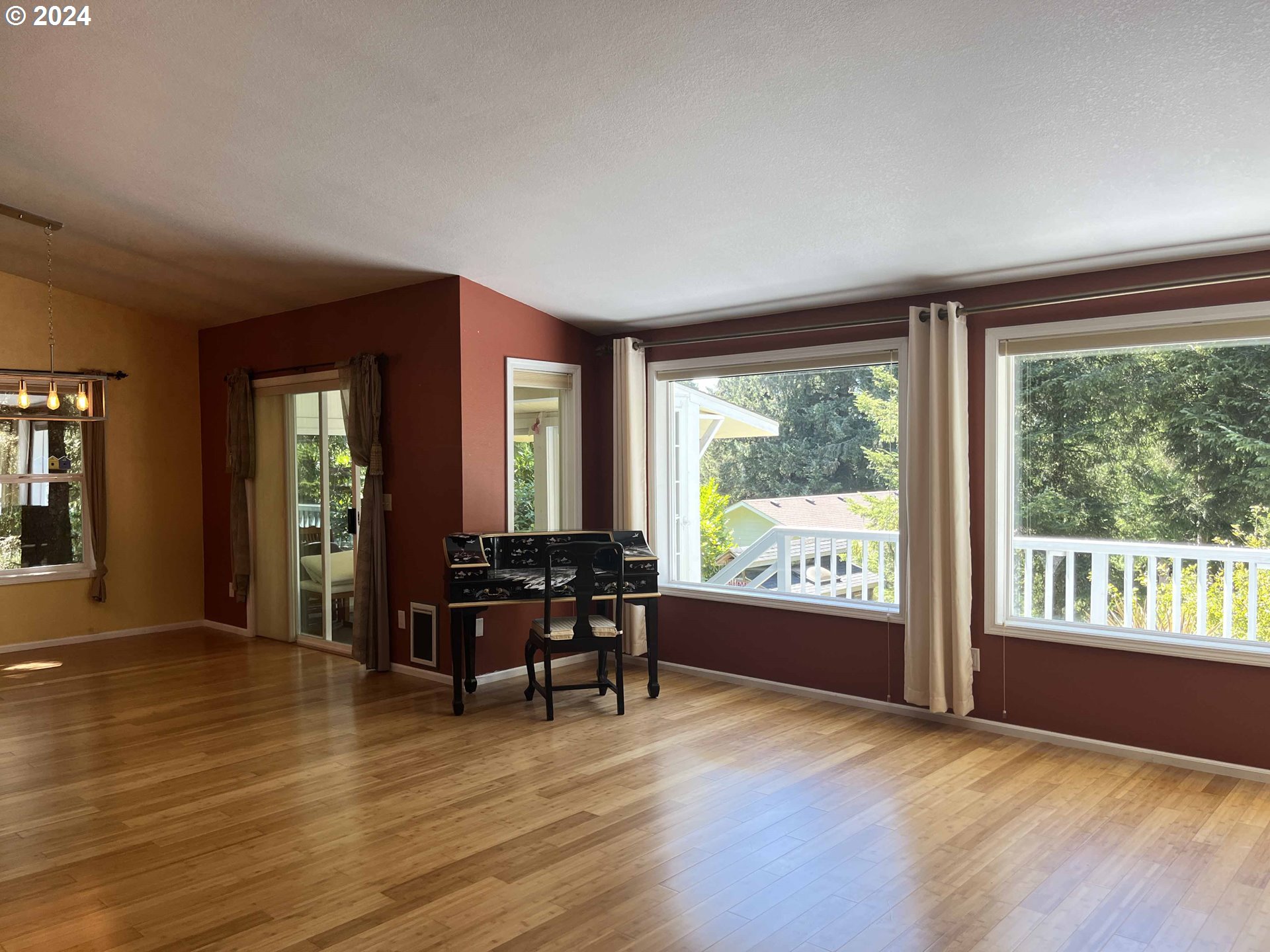 83480 Clear Lake Road Florence, OR 97439 - Photo 21 of 48 a living room with furniture and large windows