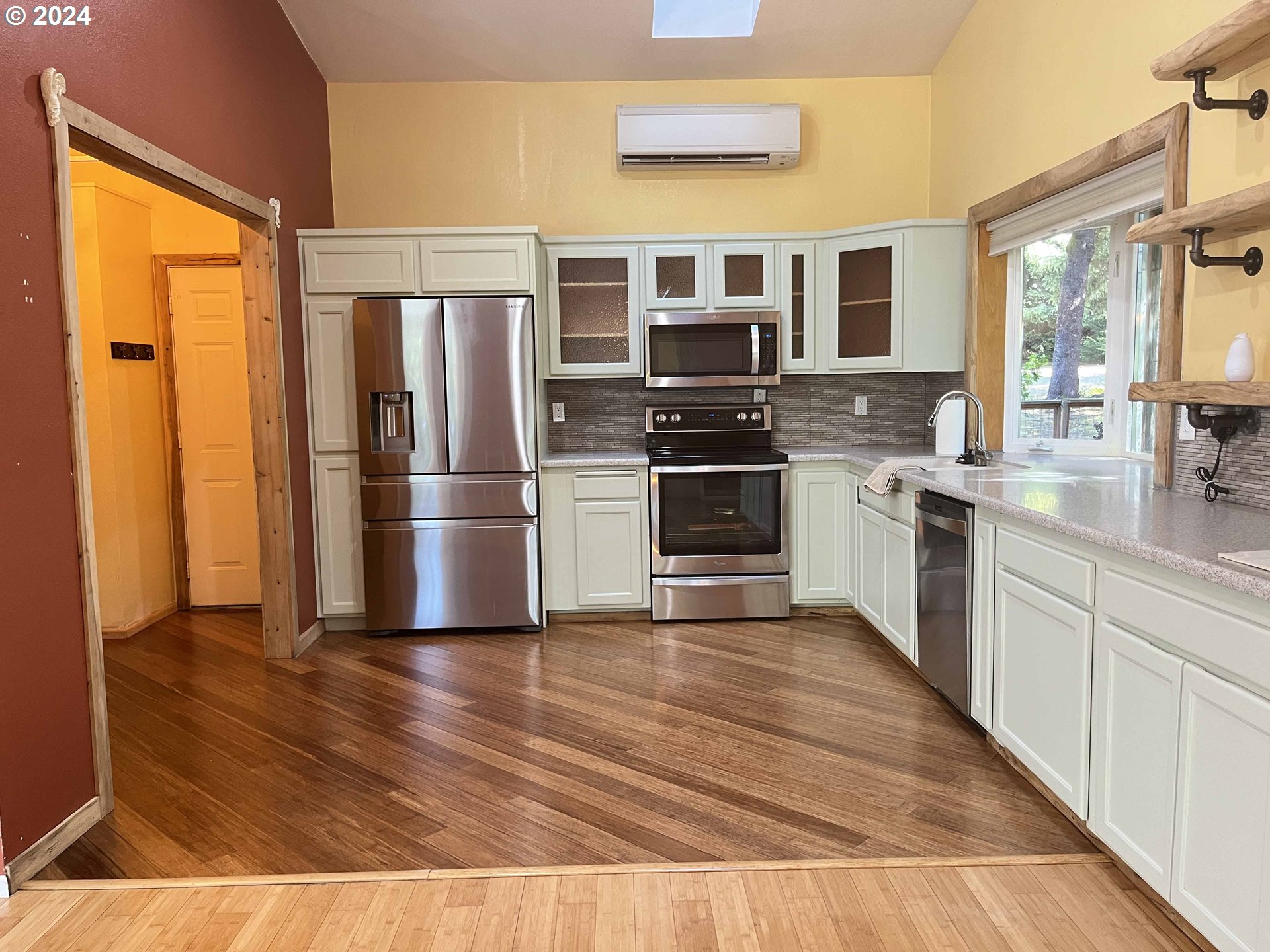 83480 Clear Lake Road Florence, OR 97439 - Photo 27 of 48 a kitchen with stainless steel appliances granite countertop a refrigerator a stove top oven a sink and dishwasher
