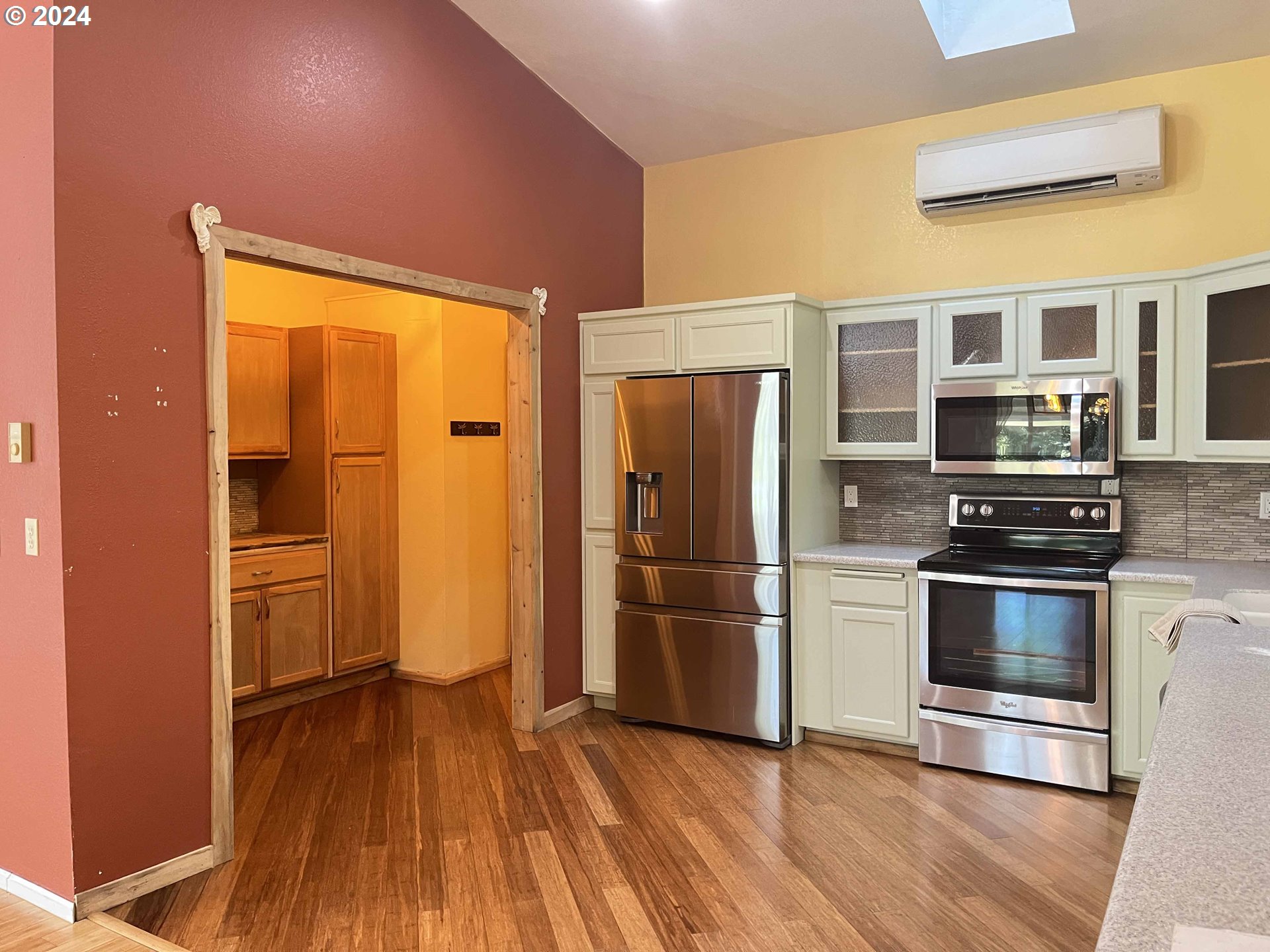 83480 Clear Lake Road Florence, OR 97439 - Photo 28 of 48 a kitchen with stainless steel appliances a refrigerator and a stove top oven