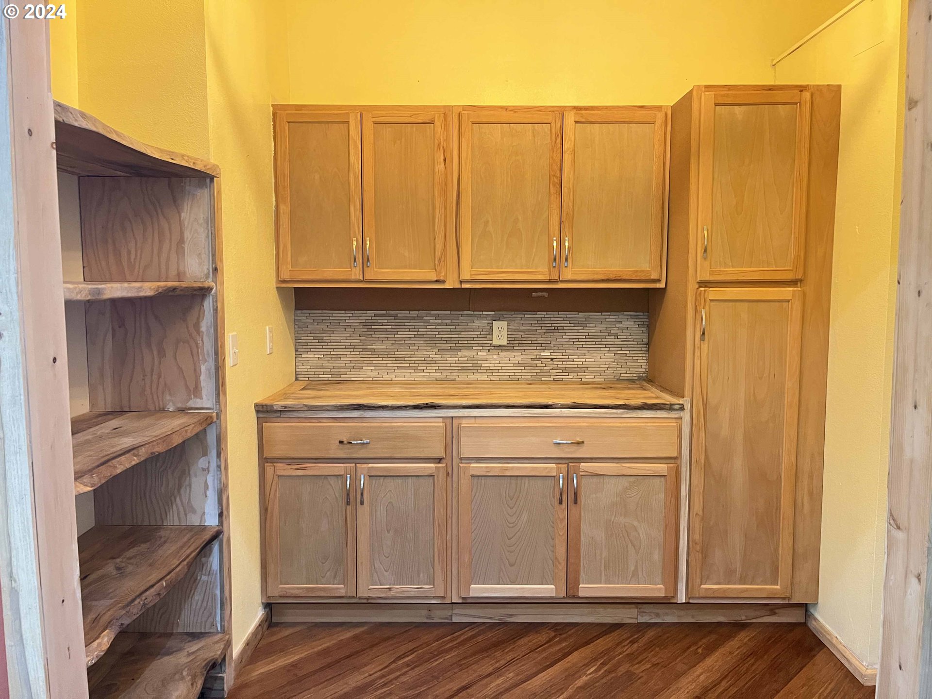 83480 Clear Lake Road Florence, OR 97439 - Photo 29 of 48 a view of kitchen with granite countertop cabinets and refrigerator