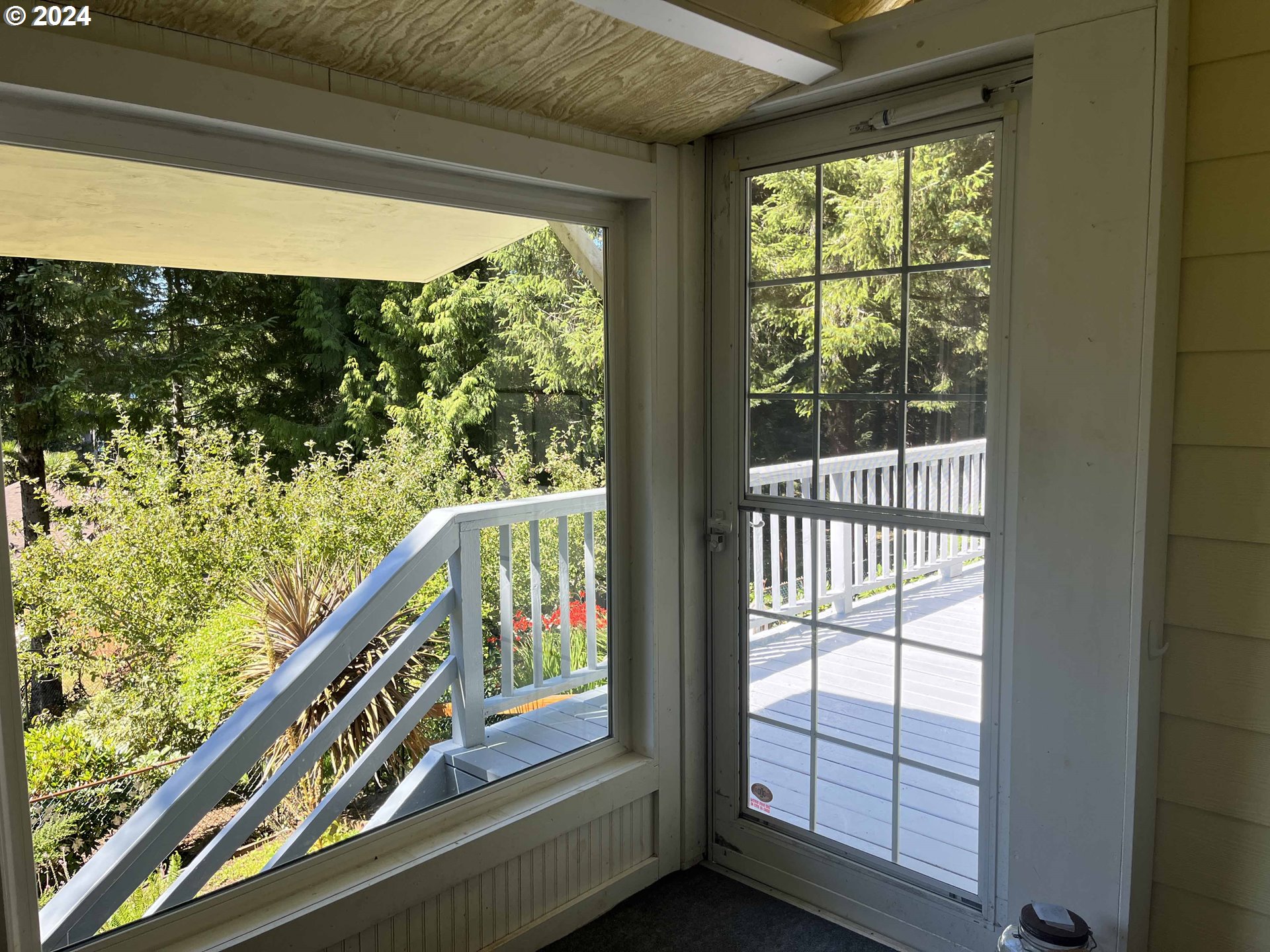 83480 Clear Lake Road Florence, OR 97439 - Photo 30 of 48 a balcony with wooden floor and outdoor space