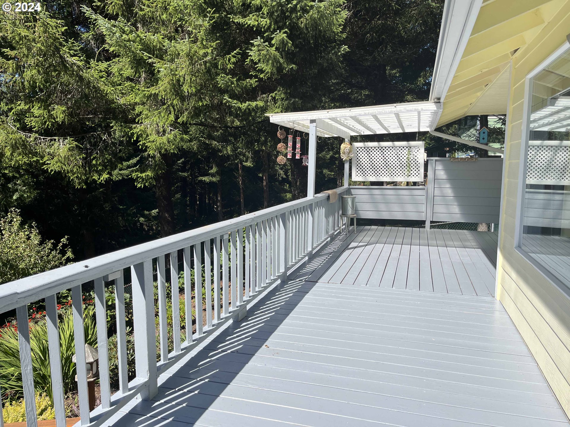 83480 Clear Lake Road Florence, OR 97439 - Photo 31 of 48 a view of balcony with wooden floor and outdoor space