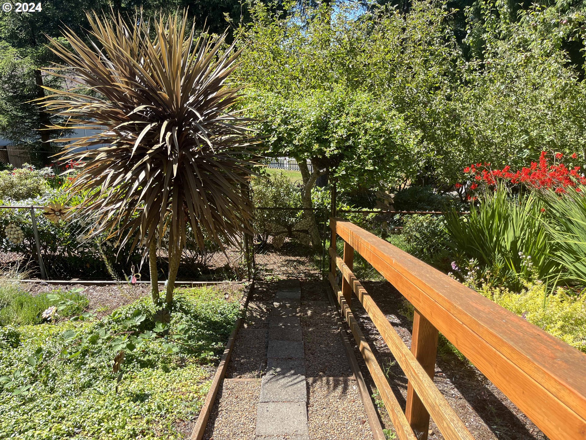 83480 Clear Lake Road Florence, OR 97439 - Photo 34 of 48 a view of balcony with wooden floor and fence