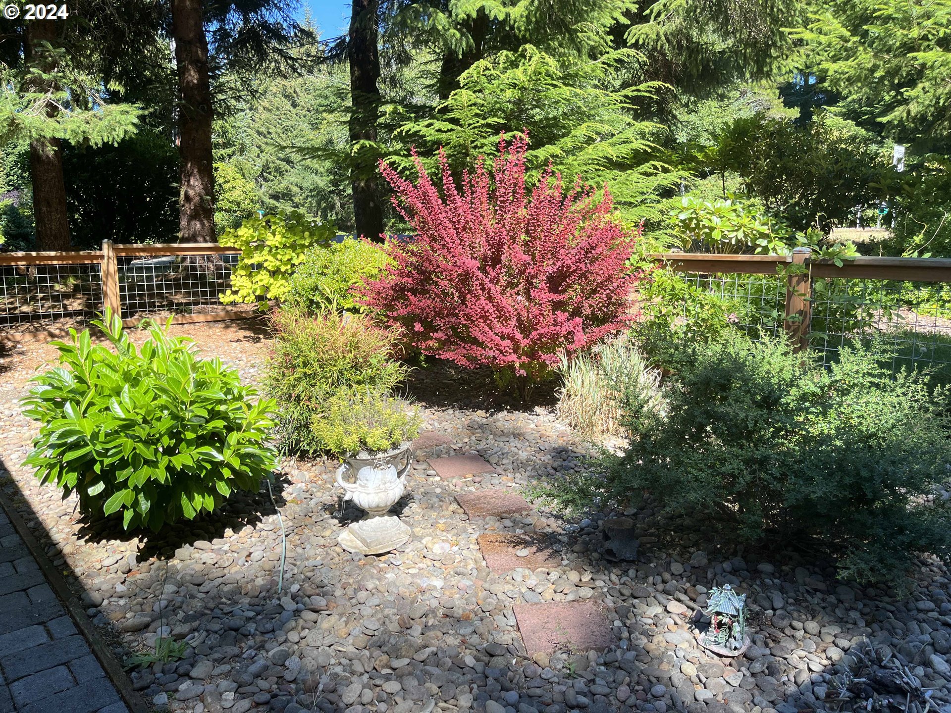 83480 Clear Lake Road Florence, OR 97439 - Photo 6 of 48 a bunch of flowers and trees