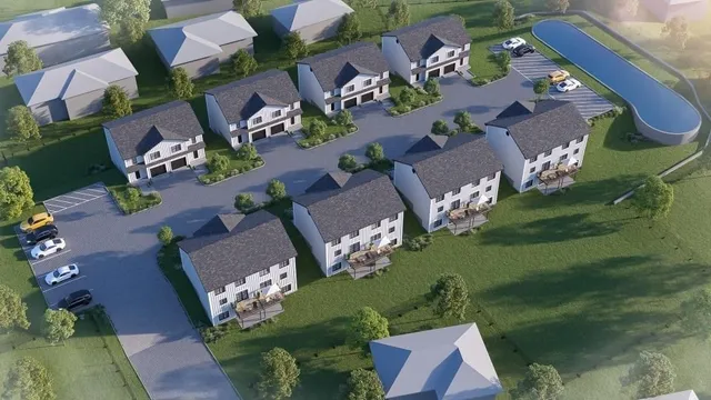 an aerial view of a house with a garden