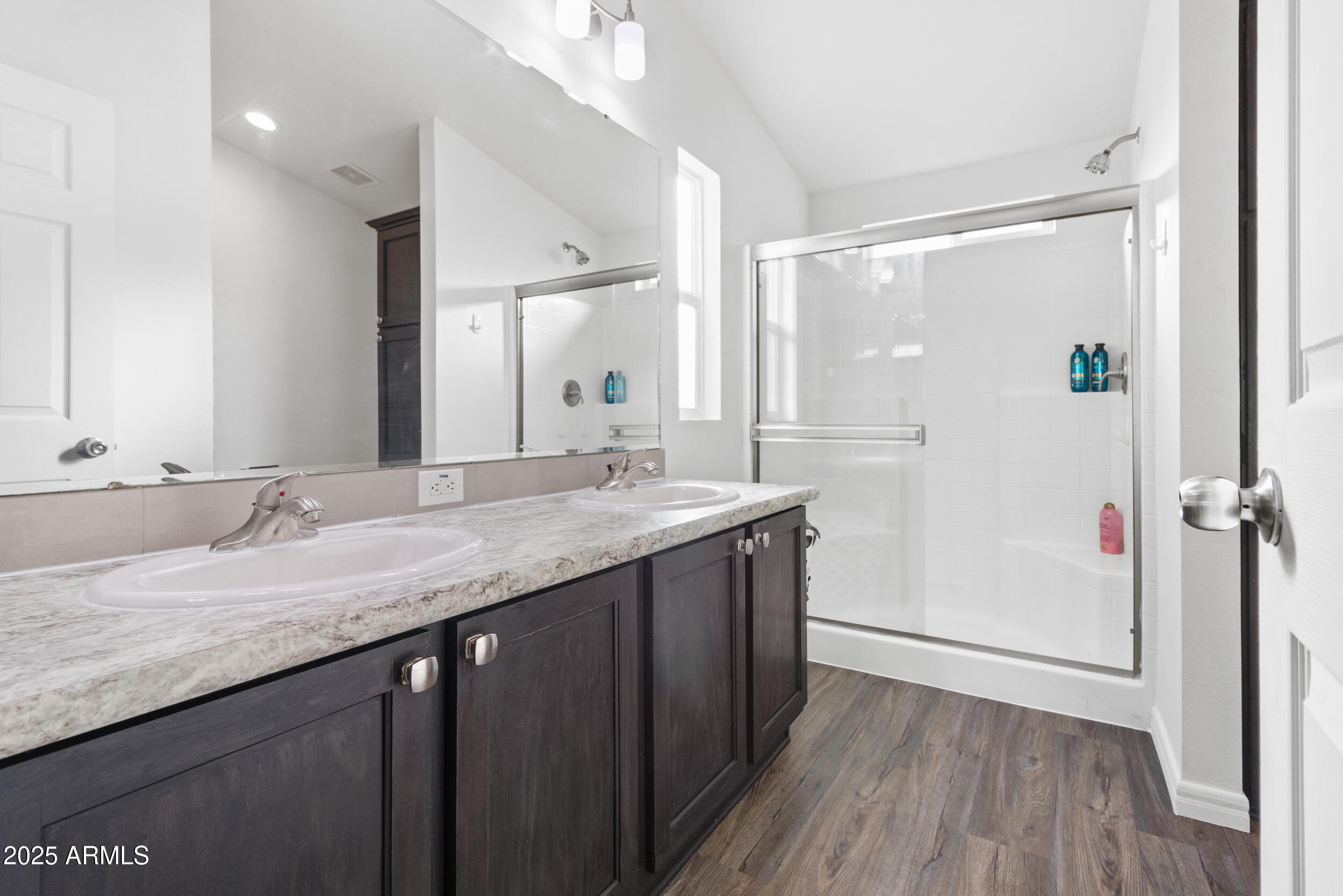 400 West Baseline Road, Unit 281 Tempe, AZ 85283 - Photo 16 of 54 a bathroom with a granite countertop sink a mirror and shower