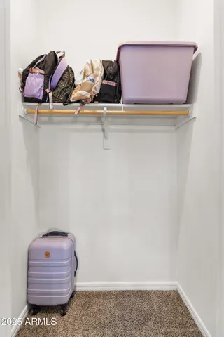 a bathroom with a sink a mirror and vanity