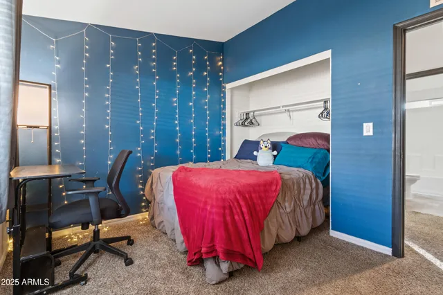 a workspace with furniture and window