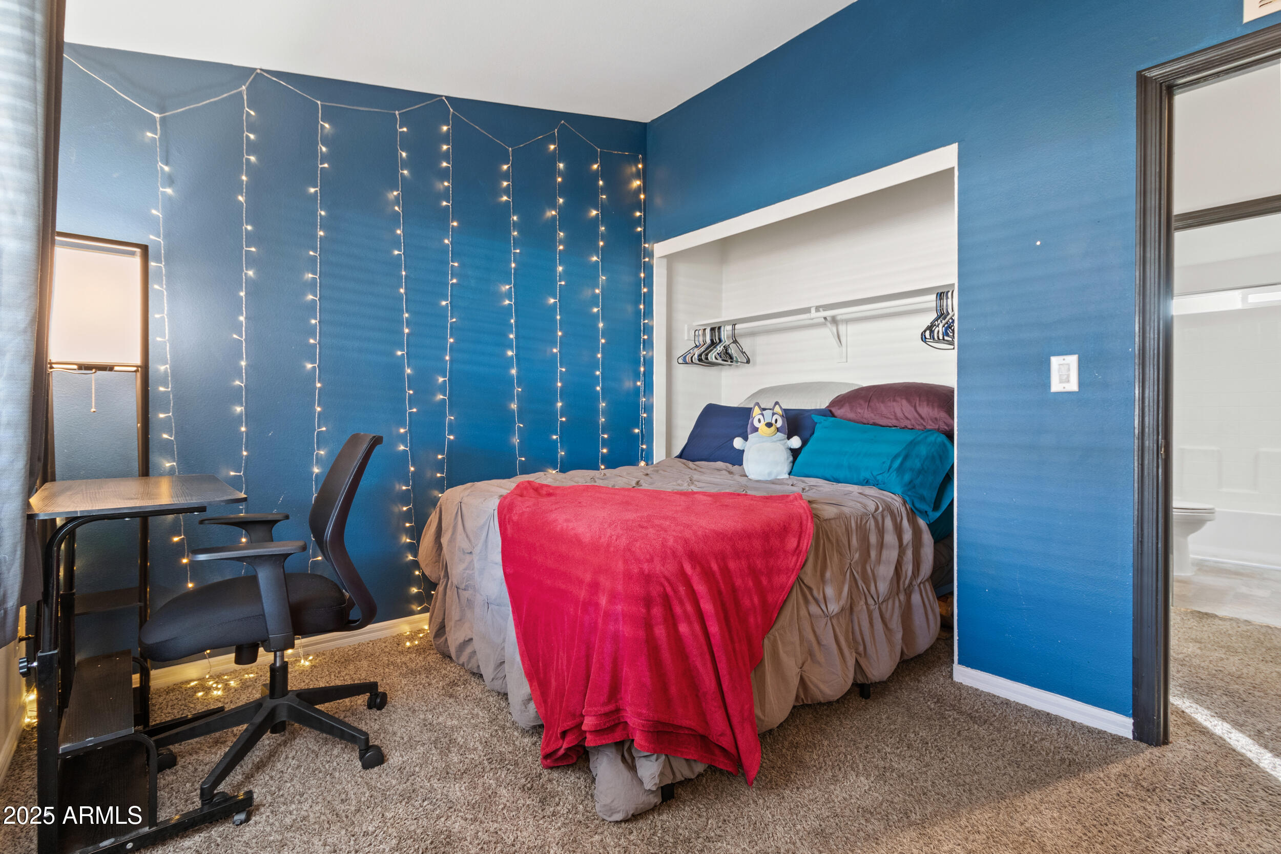 400 West Baseline Road, Unit 281 Tempe, AZ 85283 - Photo 24 of 54 a bed room with a bed and a chair