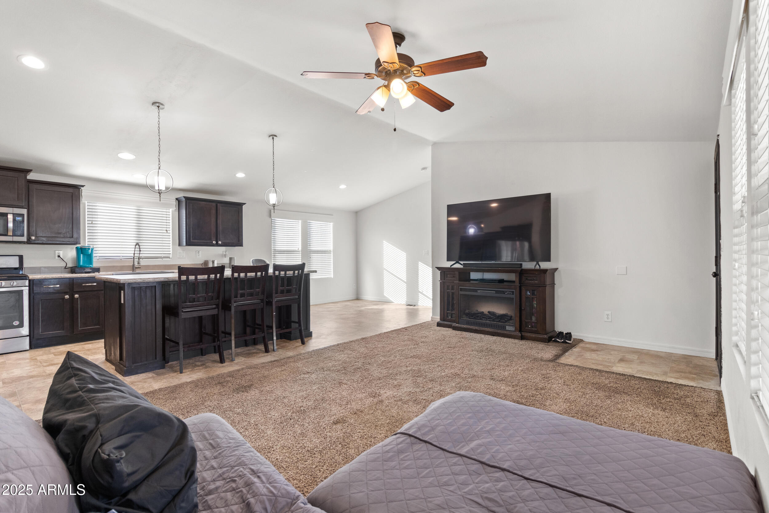 400 West Baseline Road, Unit 281 Tempe, AZ 85283 - Photo 3 of 54 a living room with furniture and kitchen view