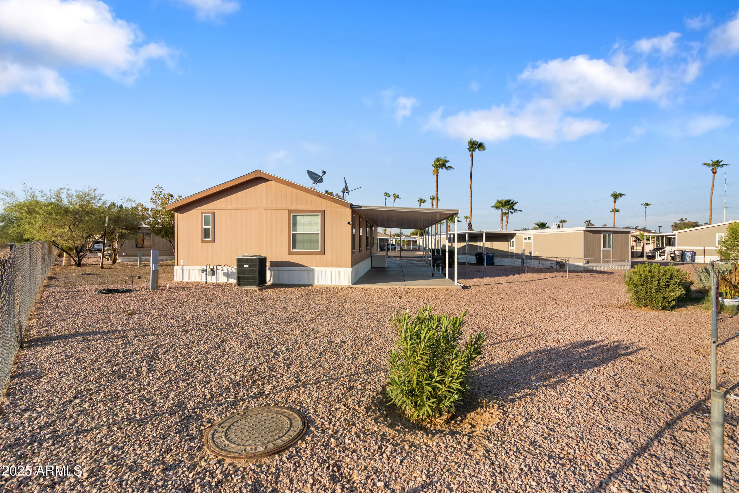 400 West Baseline Road, Unit 281 Tempe, AZ 85283 - Photo 38 of 54 a view of a house with backyard and porch